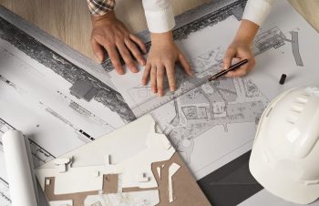 Architectes Qui Travaillent Sur Des Plans De Construction